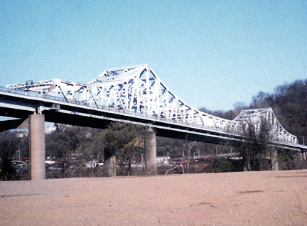 The distinctive William D. Mansfield Bridge, completed just after World War II, crosses the Monongahela River to connect McKeesport with Dravosburg and West Mifflin.